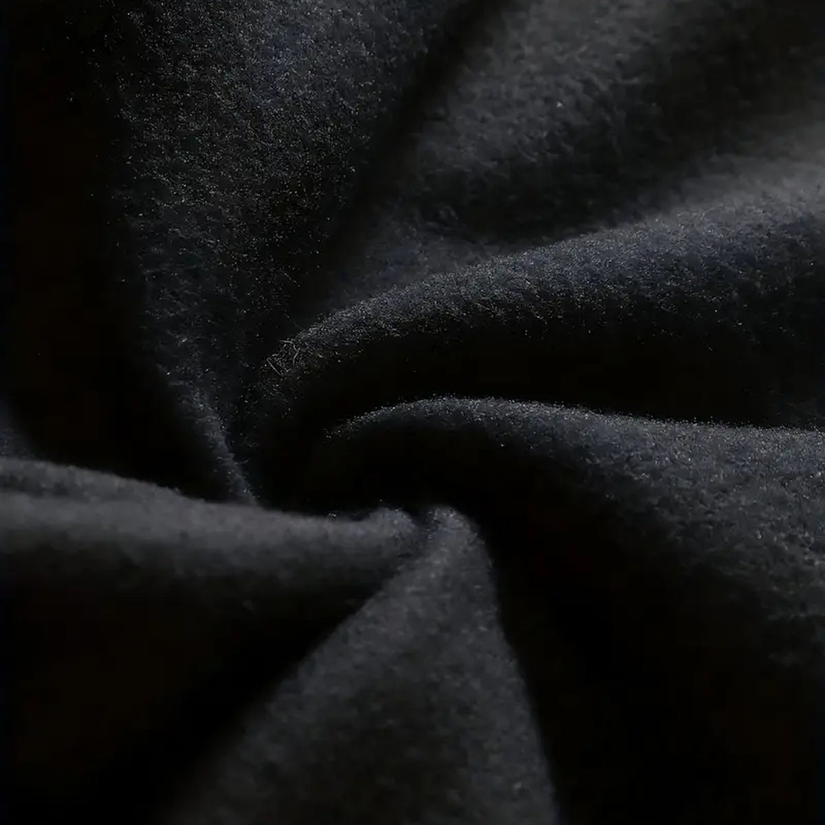 Close-up of the black Strike A Light Graphic Crewneck Sweatshirt fabric texture
