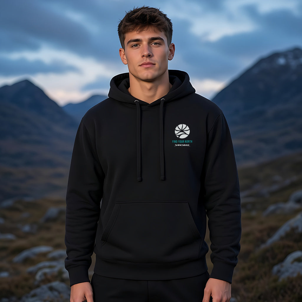 Model wearing the Northern Light hoodie in black, front view