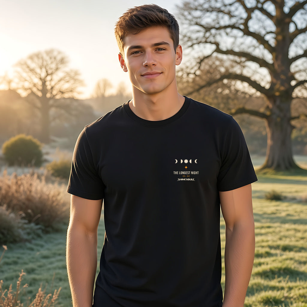 Model wearing the Solstice T-shirt in black, front view