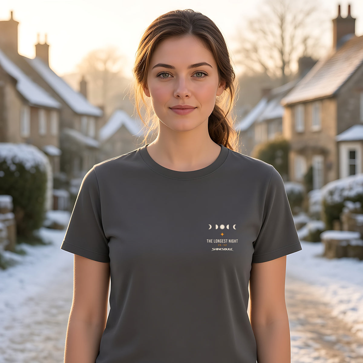 Model wearing the Solstice T-shirt in charcoal, front view