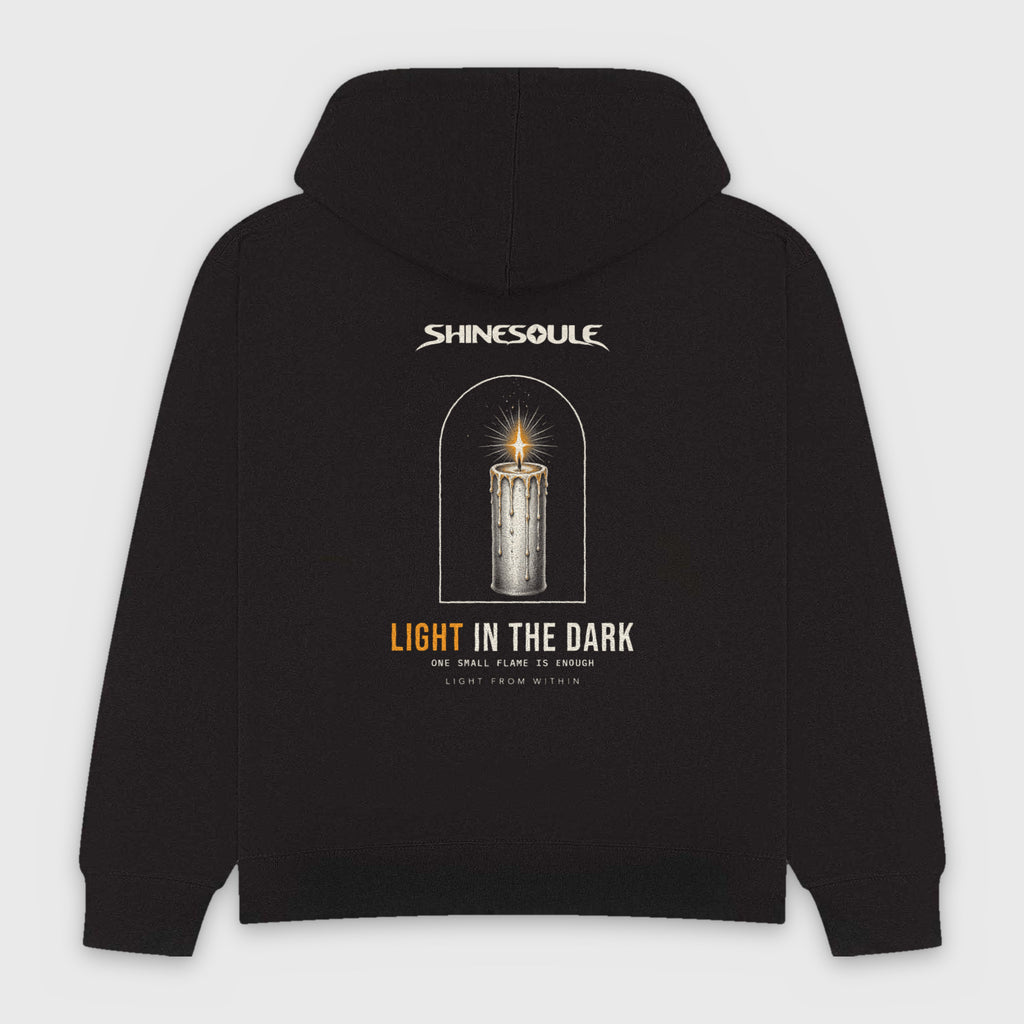 Black Light In The Dark Graphic Hoodie back view with candle-in-the-arch LIGHT IN THE DARK back print