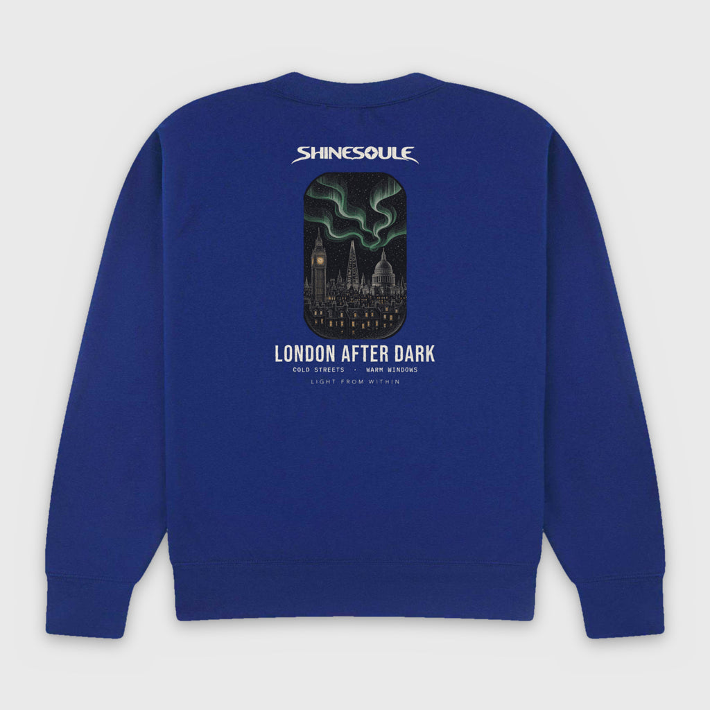 Cobalt Blue London After Dark Graphic Crewneck Sweatshirt back view with London skyline aurora back print