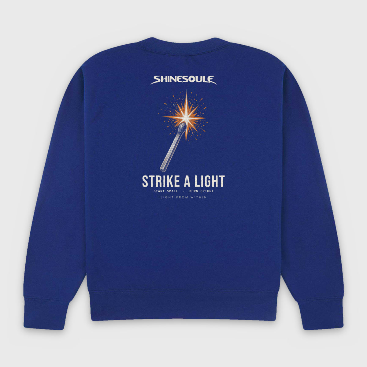 Cobalt Blue Strike A Light Graphic Crewneck Sweatshirt back view with struck-match STRIKE A LIGHT back print